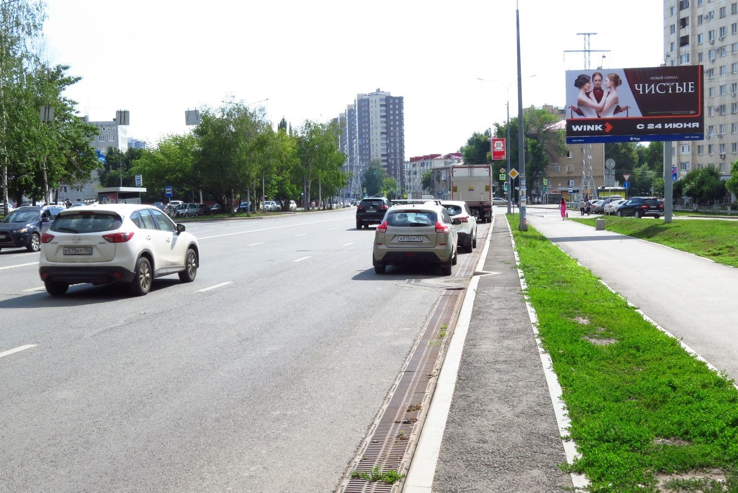 Уфа.  ул. Комсомольская, рядом со зданием № 141, сторона А