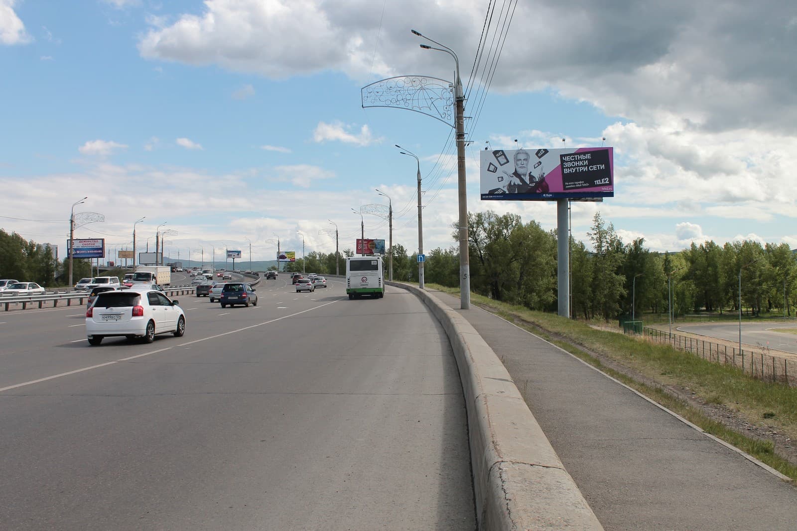 Октябрьский мост им. Павла Стефановича Федирко, 1,3 км до съезда на пер. Сибирский, сторона А Красноярск. Октябрьский мост им. Павла Стефановича Федирко, 1,3 км до съезда на пер. Сибирский, сторона А
