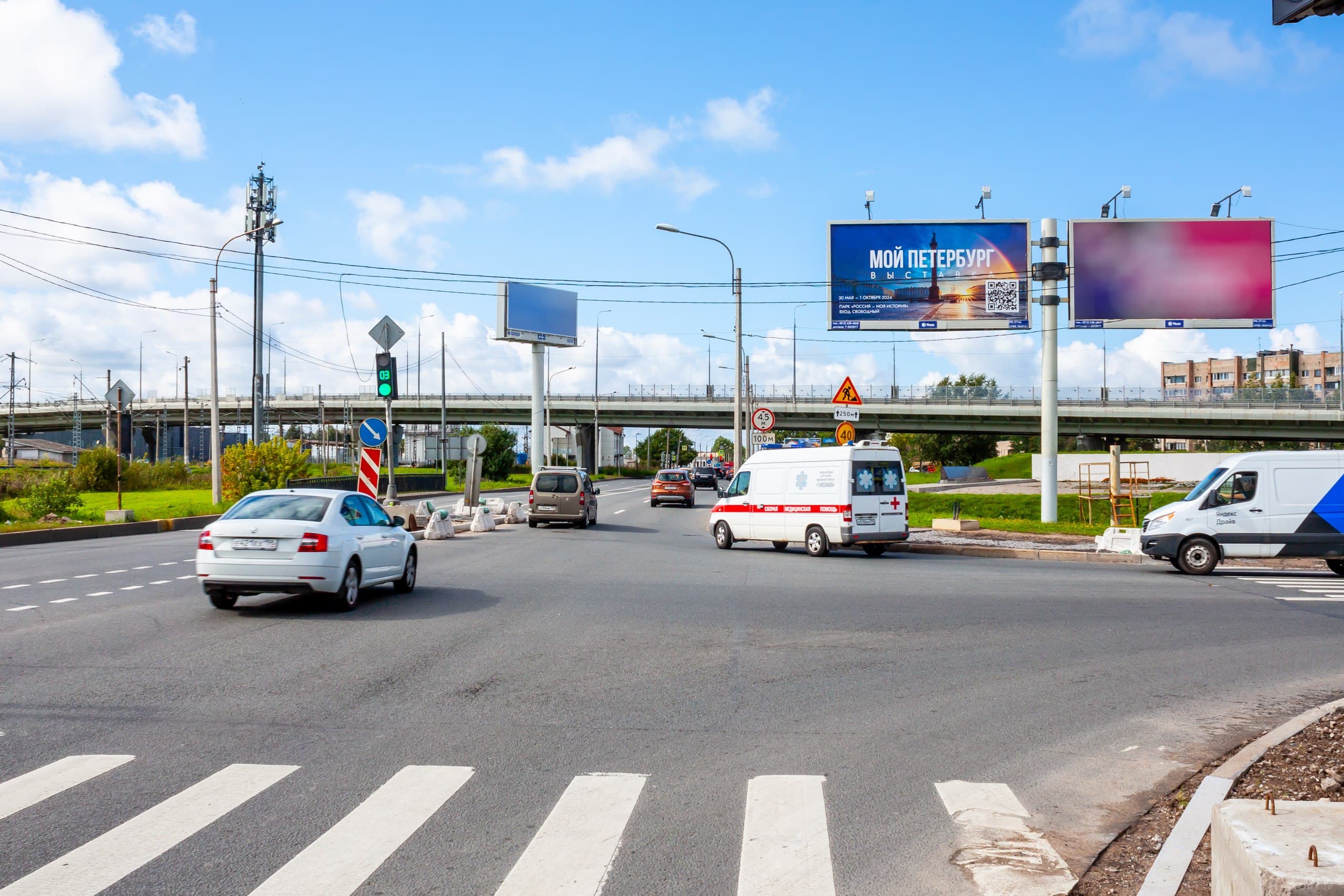 Народного Ополчения проспект, нечетная сторона, 150 м до Х с проспектом Маршала Жукова, левый, (светофор), сторона А1 Санкт-Петербург. Народного Ополчения проспект, нечетная сторона, 150 м до Х с проспектом Маршала Жукова, левый, (светофор), сторона А1