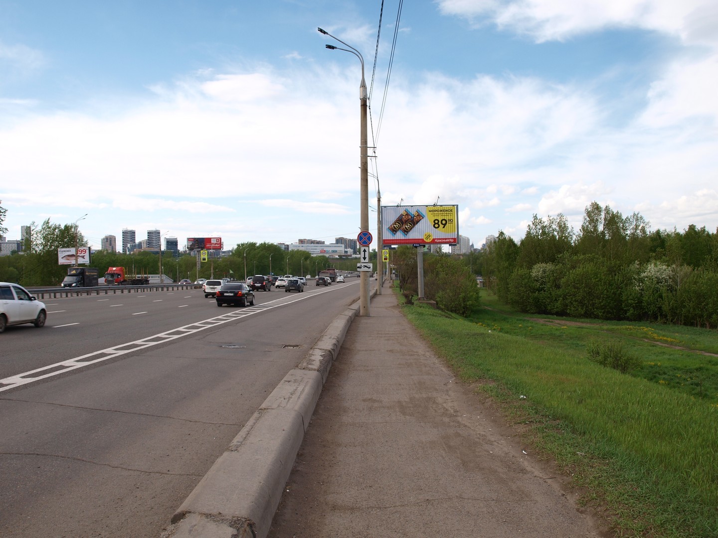 Реклама 3x6 по адресу Октябрьский мост (о-в Татышева, 140 м до остановки при движении на левый берег)(призматрон)